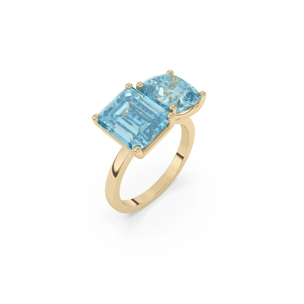 blue topaz two stone ring in 14k yellow gold