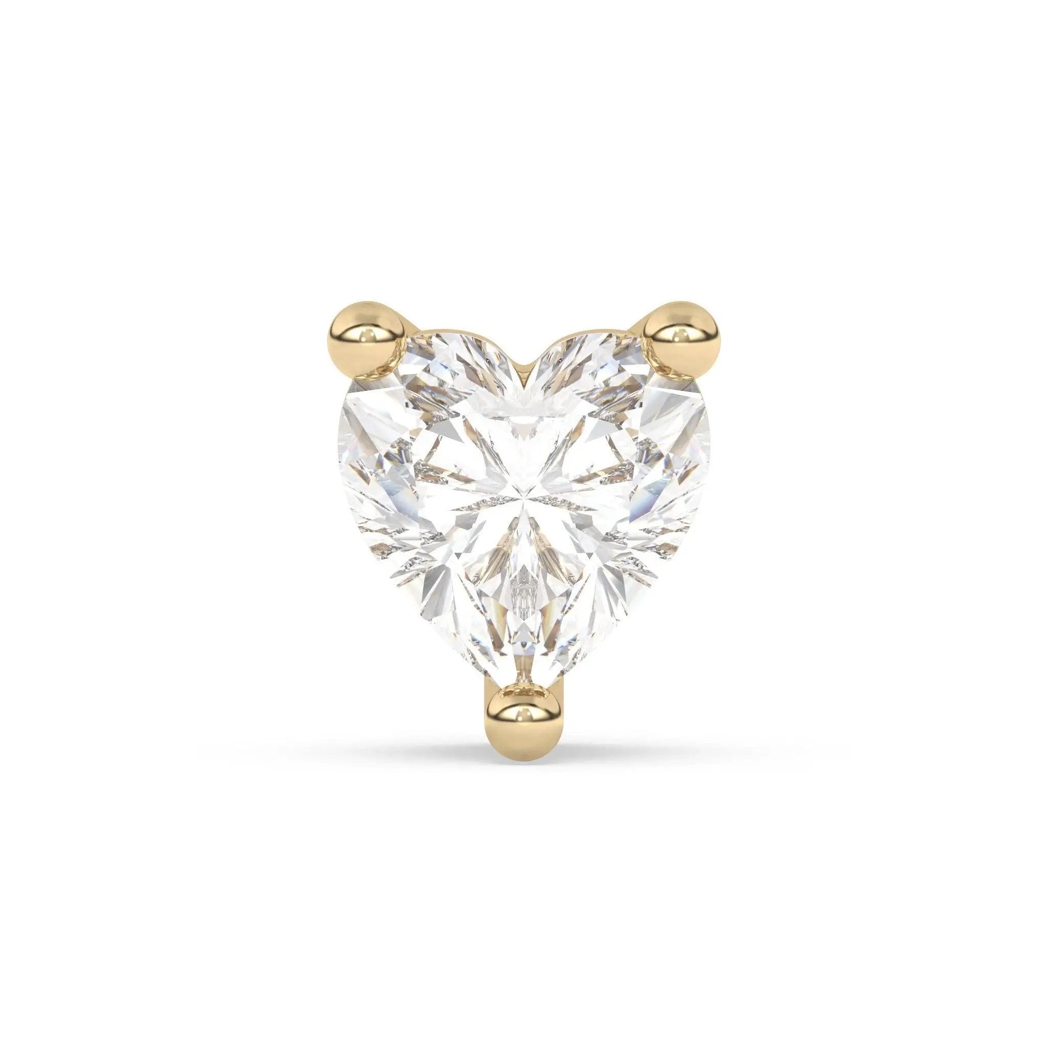 diamond stud earring handmade with a heart shaped diamond set in 14k solid gold