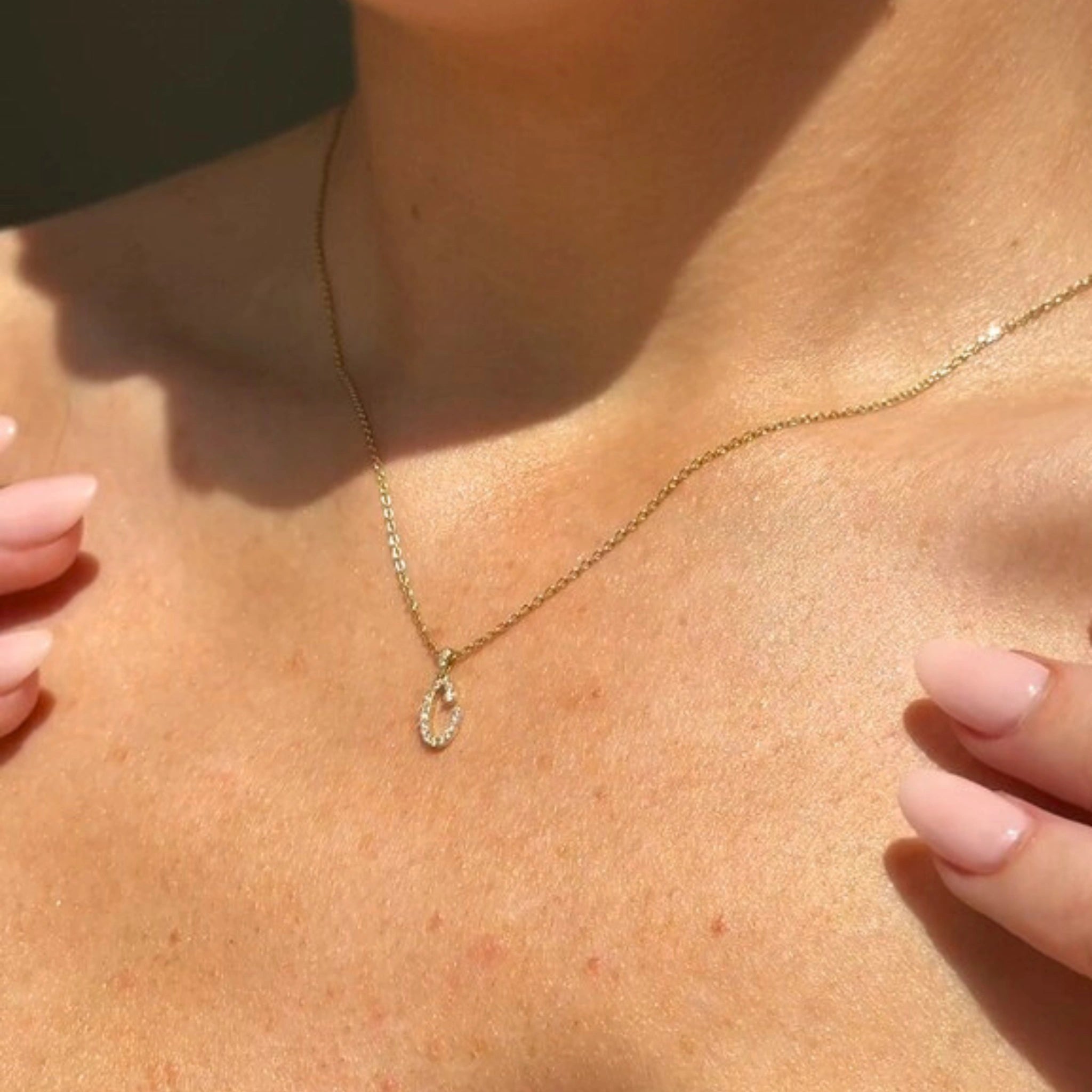 diamond letter pendant