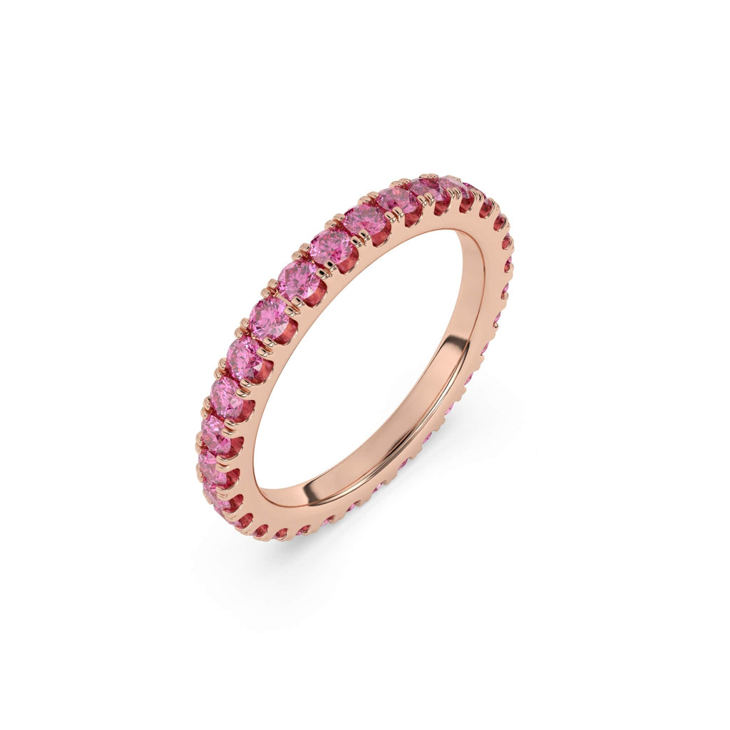 Pink sapphire stacking ring or eternity ring set in 14k rose gold. The sapphires and the rose gold pair beautifully together