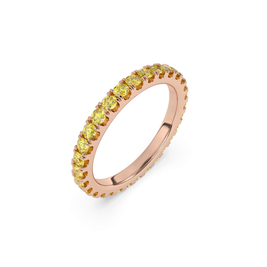 yellow sapphire stacking or eternity ring in 14k rose gold.