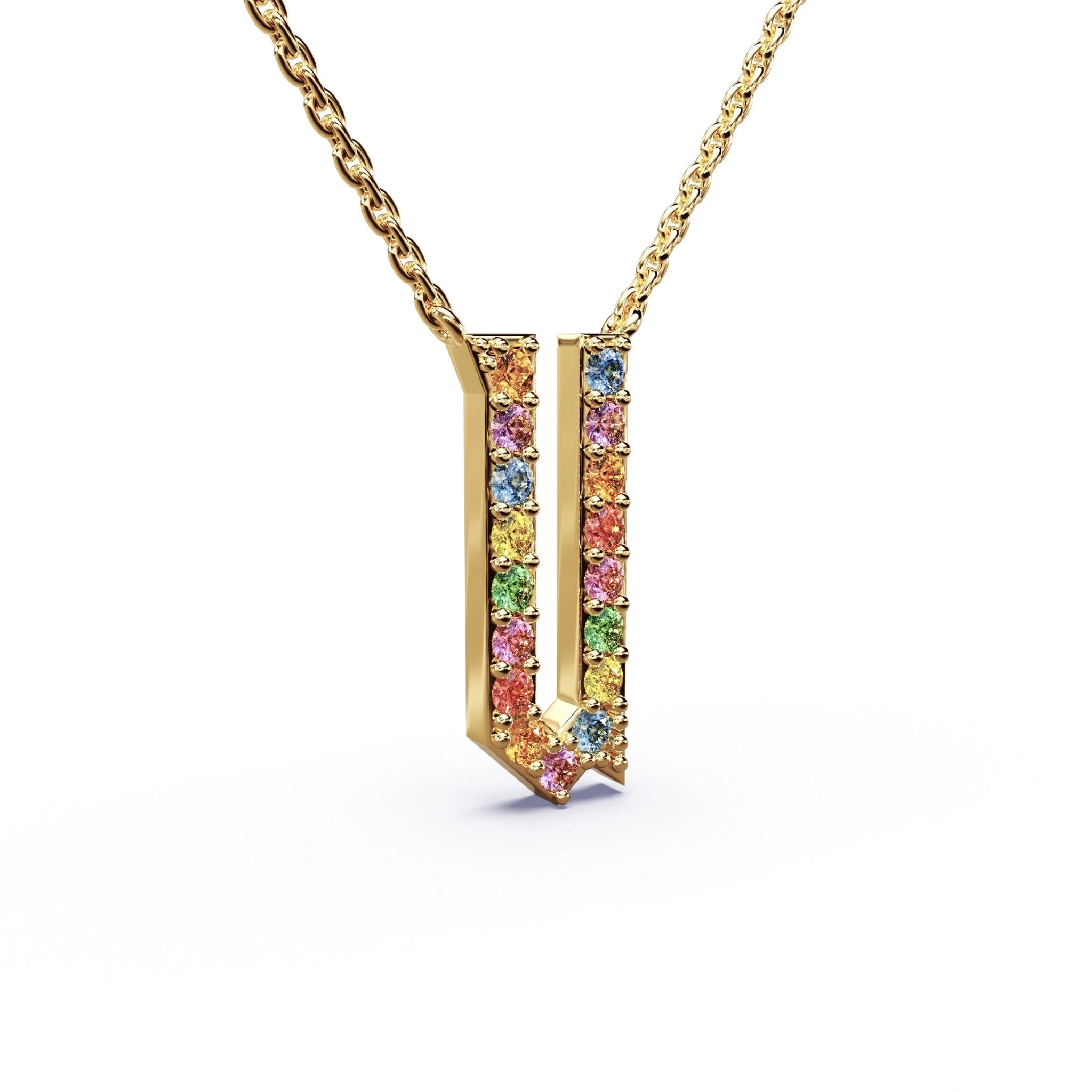 Gold necklace with a colorful pendant on a white background