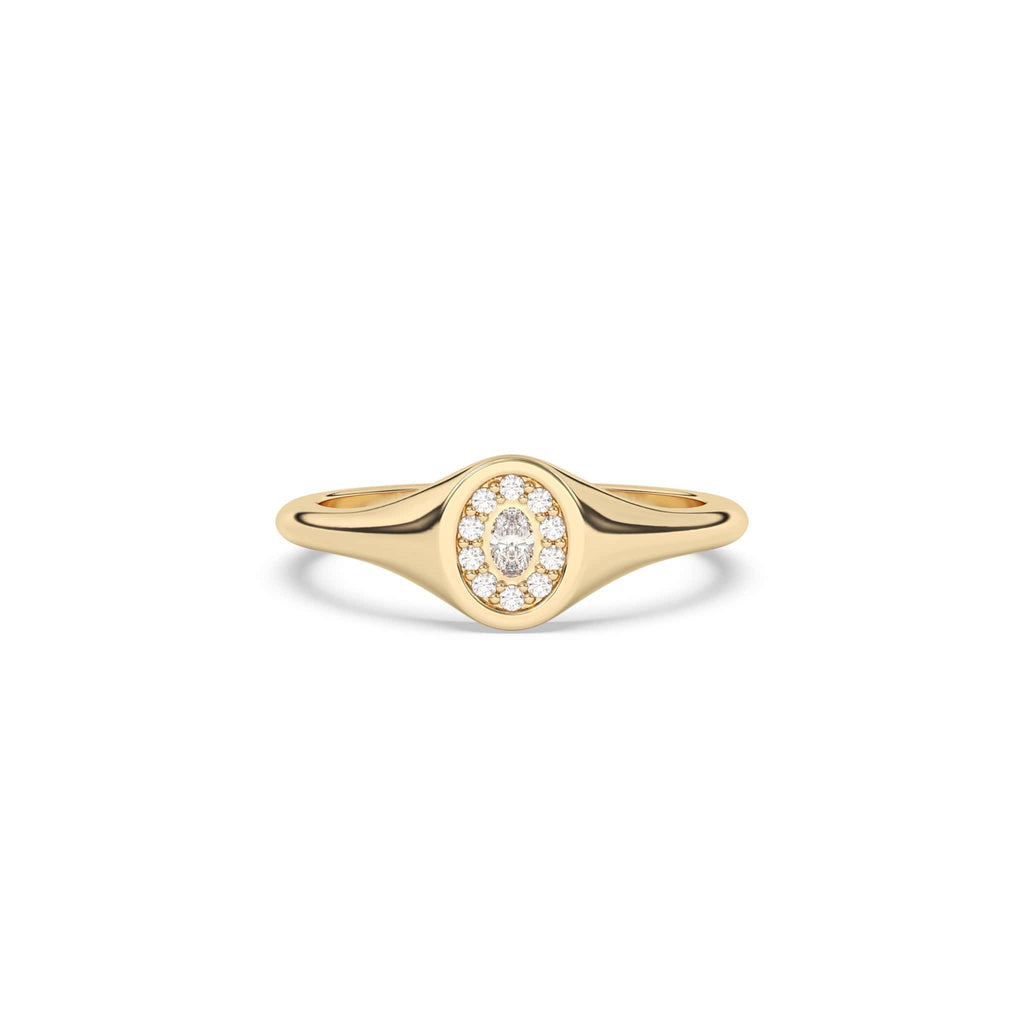 solid gold oval signet ring set with diamonds