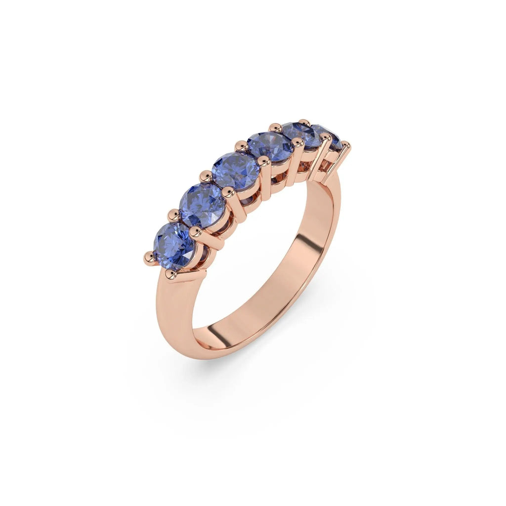 best selling solid gold six stone ring handmade in blue sapphires from ceylon set in 14k soli gold
