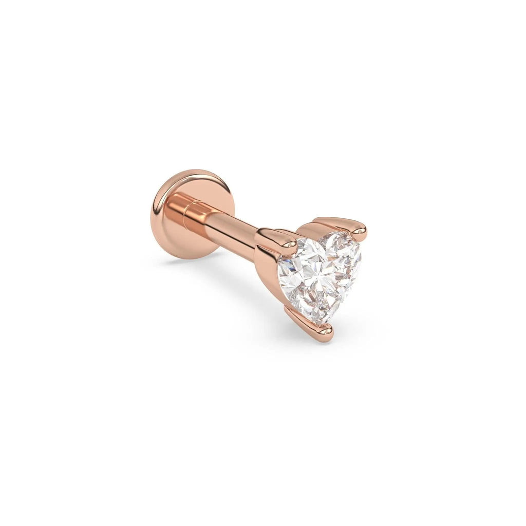 diamond stud earring handmade with a heart shaped diamond set in 14k solid gold