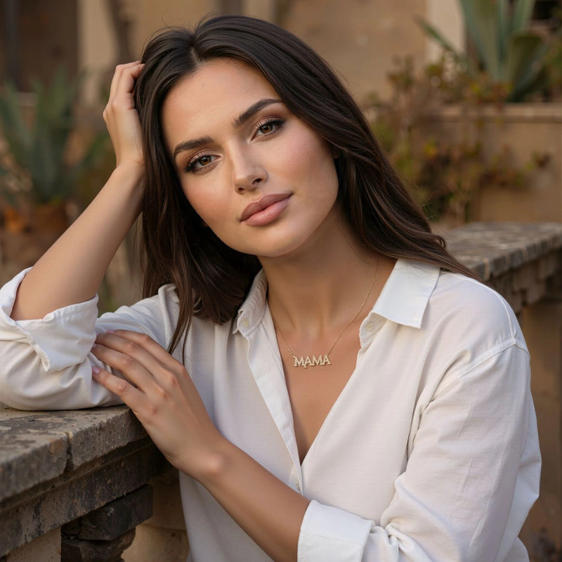 Bold Diamond Mama Necklace worn with a white shirt