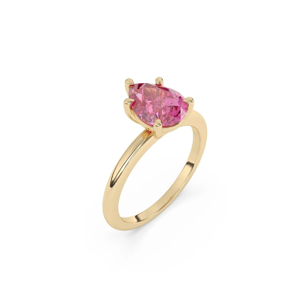 pear ing handmade with pink topaz set in 14k solid gold