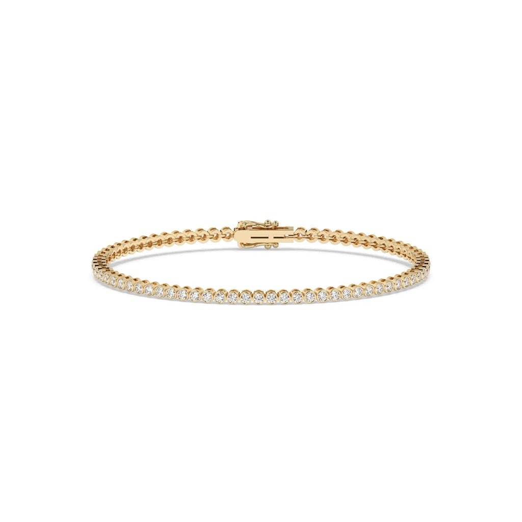 diamond bezel set tennis bracelet handmade in 18k solid gold 